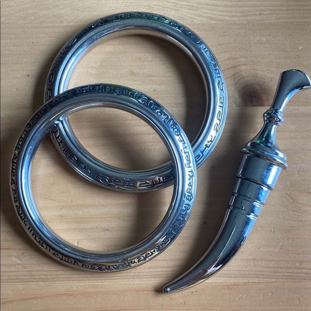 Silver Kara (2) and Kirpan. Sikh Faith Spiritual Pieces.